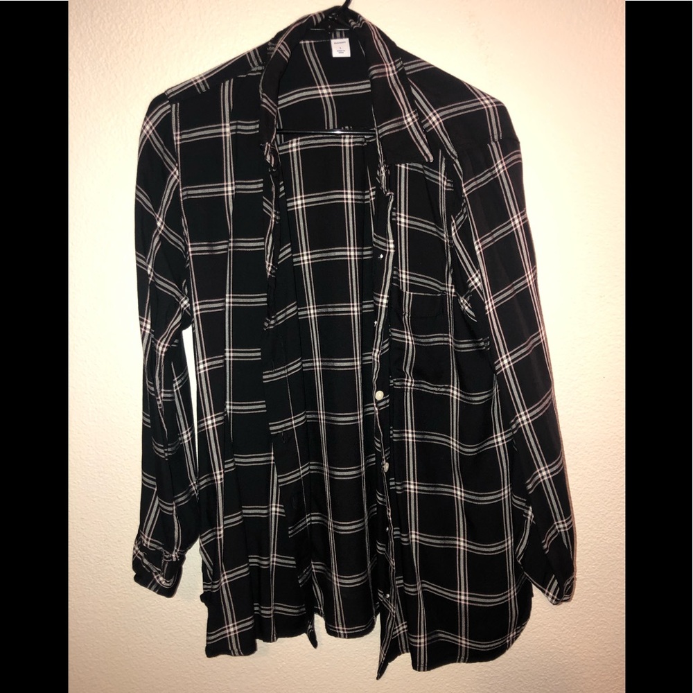 Pink/white/black button up shirt.